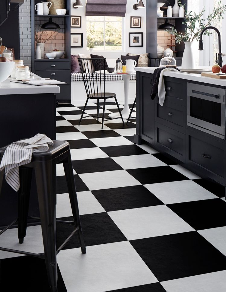 checkered luxury vinyl tile floors in a stylish Williston kitchen