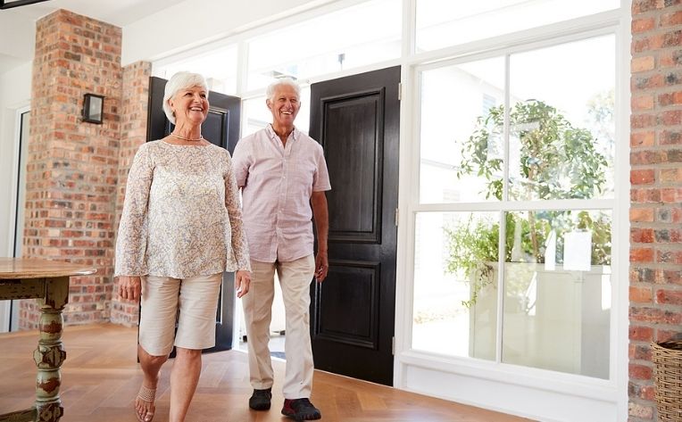 seniors walking on vinyl home flooring