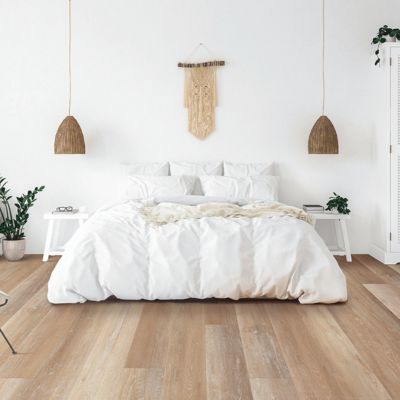 luxury vinyl plank floors in a bright Williston bedroom
