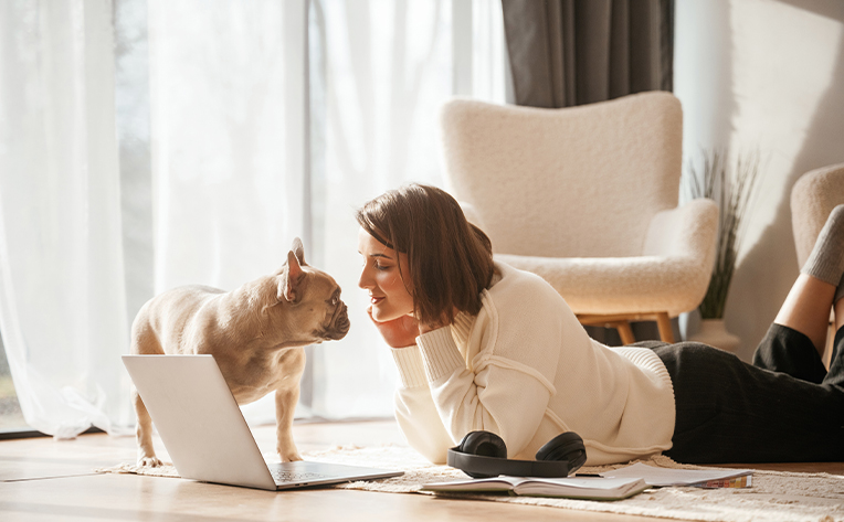 luxury vinyl flooring with a woman and her dog